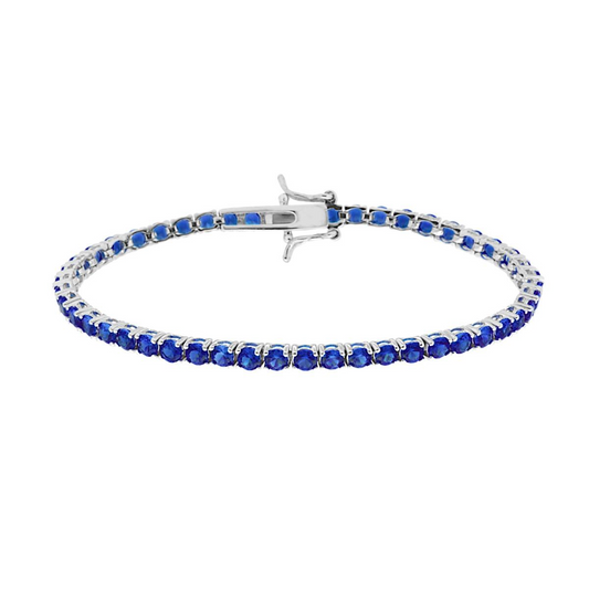 Bracciale a riviera con zaffiri blu in argento sterling.