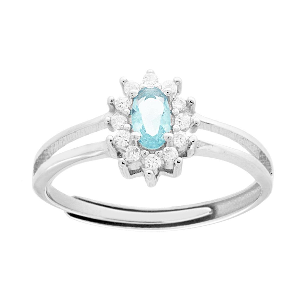 Anello in oro bianco con acquamarina ovale e diamanti.