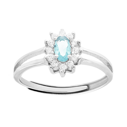 Anello in oro bianco con acquamarina ovale e diamanti.