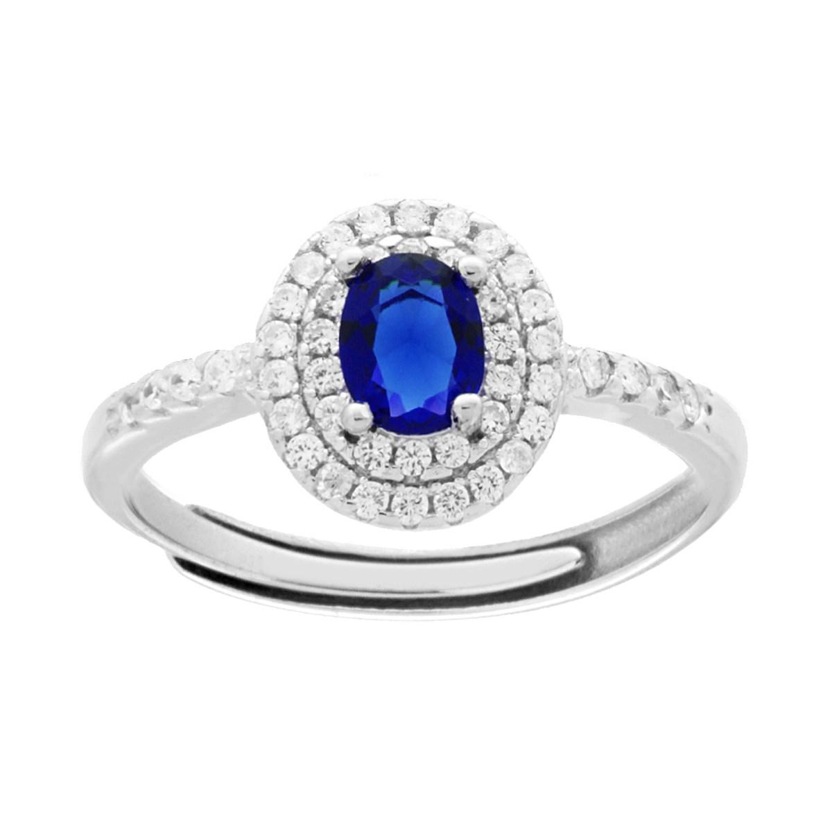 Anello in argento con zaffiro ovale centrale circondato da due file di zirconi e pavé lungo la fascia.