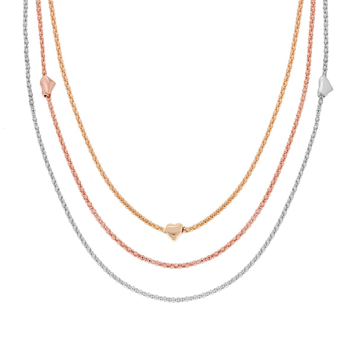 Collana a tre fili in oro, oro rosa e argento, con ciondoli a cuore.