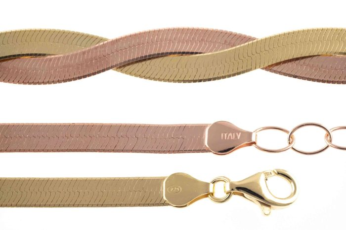 Collana a spina di pesce in oro rosa e giallo, con chiusura a moschettone.