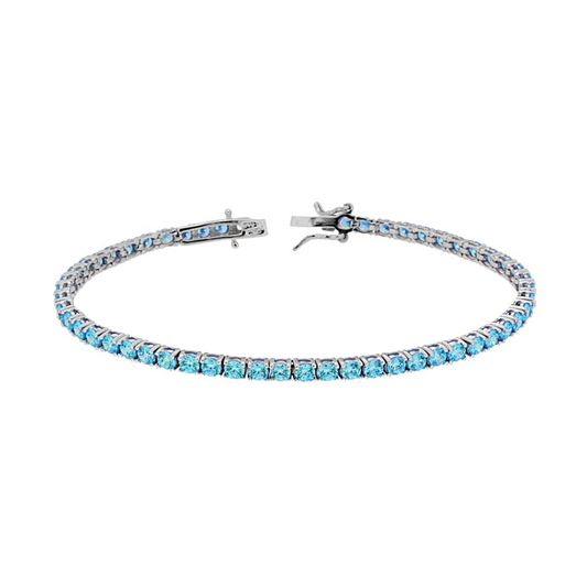 Bracciale tennis in argento con pietre azzurre.