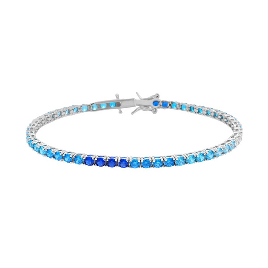 Bracciale tennis in argento con opali sfumati dal blu scuro al celeste.