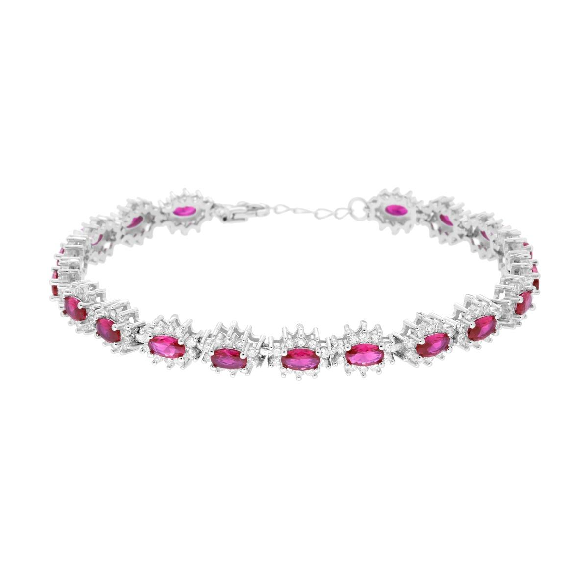 Bracciale in argento con rubini ovali e contorno di zirconi.