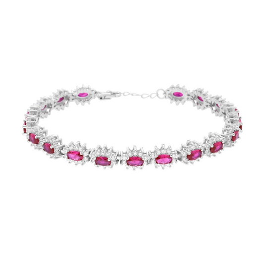 Bracciale in argento con rubini ovali e contorno di zirconi.