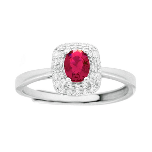 Anello in argento con rubino centrale ovale e cornice di zirconi.
