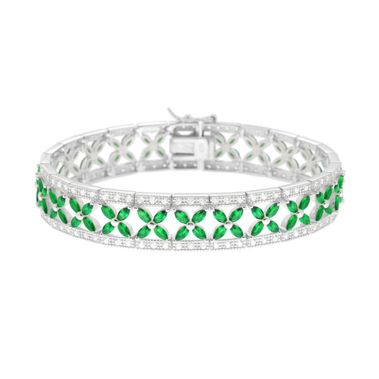 Bracciale a fascia in argento con smeraldi e diamanti.