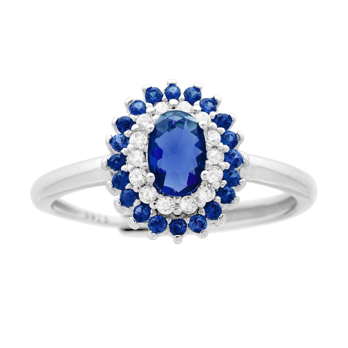 Anello in argento con zaffiro ovale e doppia corona di diamanti e zaffiri blu.
