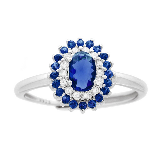 Anello in argento con zaffiro ovale e doppia corona di diamanti e zaffiri blu.