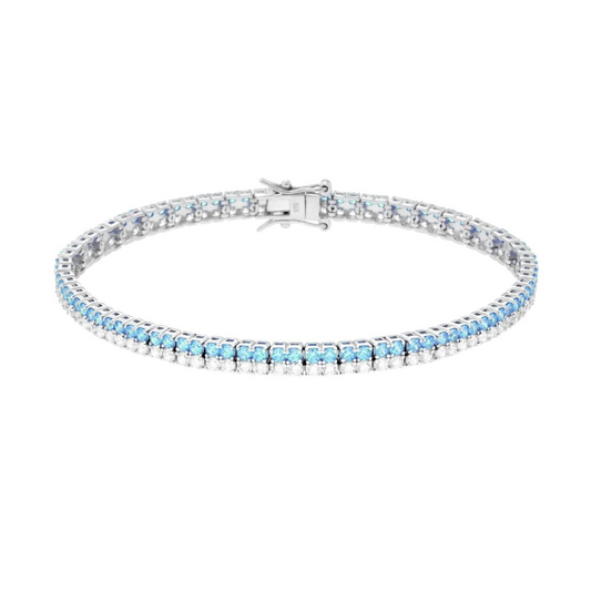 Bracciale a riviera con due file di pietre: una di zirconi bianchi e l'altra di zirconi azzurri, con chiusura a moschettone.