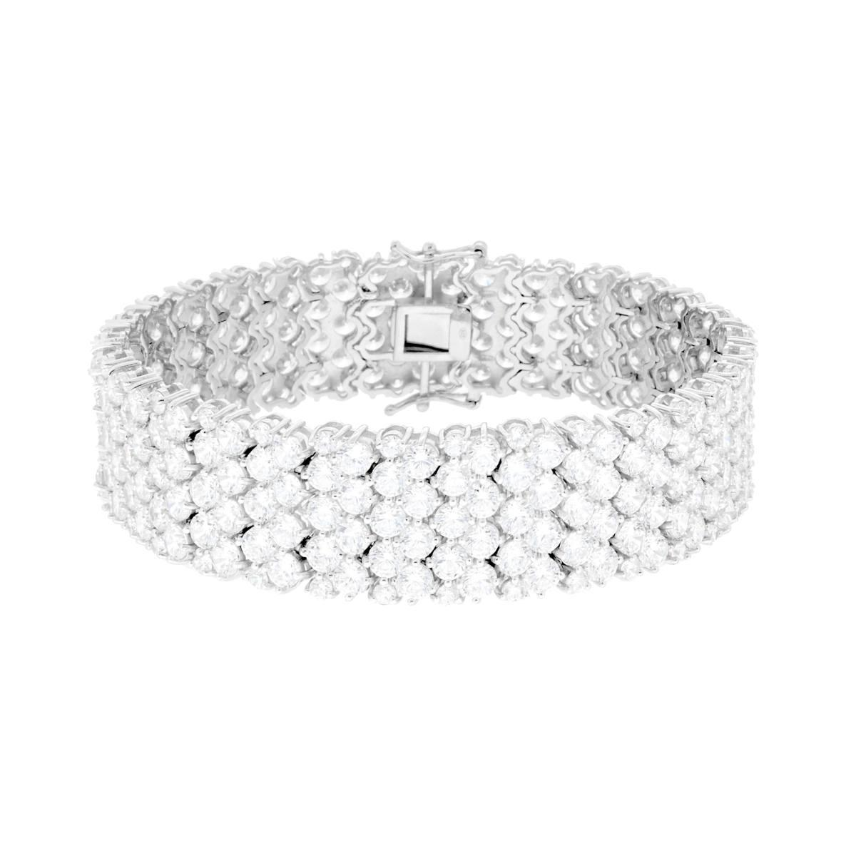 Bracciale in oro bianco con tre file di diamanti rotondi, chiusura a scomparsa.