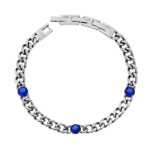 Bracciale a catena d'argento con tre pietre blu.
