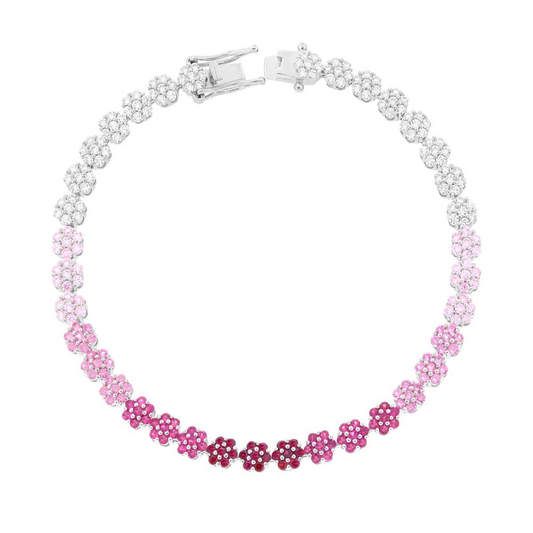 Bracciale tennis con fiori in cristallo sfumati dal bianco al rosa scuro.
