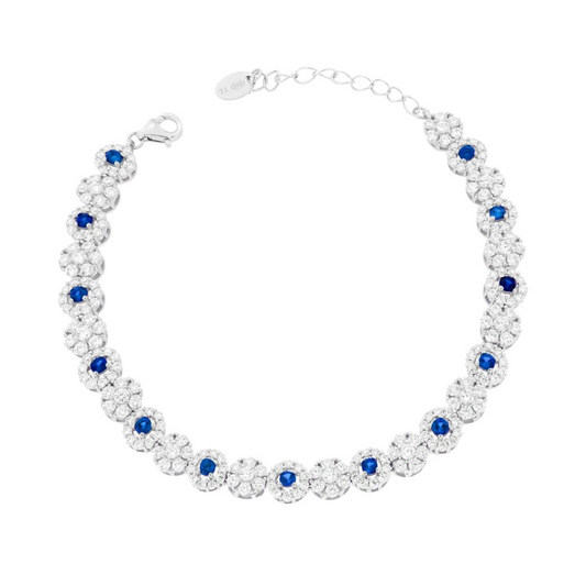 Bracciale tennis in argento con zirconi bianchi e pietre blu taglio tondo a formare dei fiori.