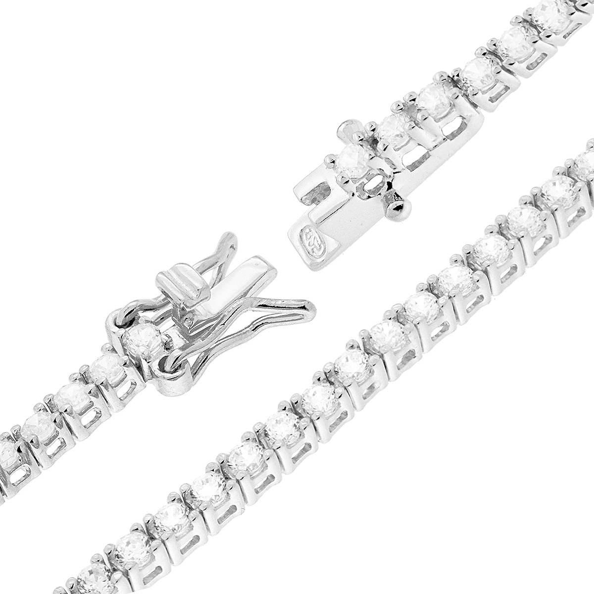 Bracciale a tennis in oro bianco con diamanti, chiusura a scatto visibile.