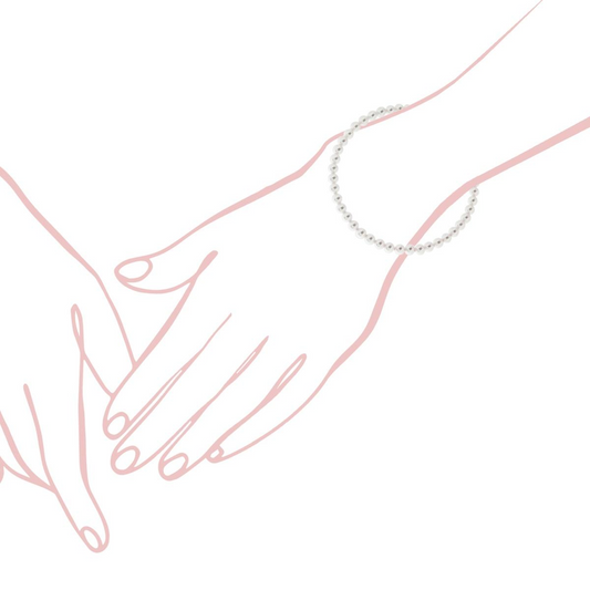 Disegno a linee rosa di due mani che si tengono, con un braccialetto di perle al polso di una persona.