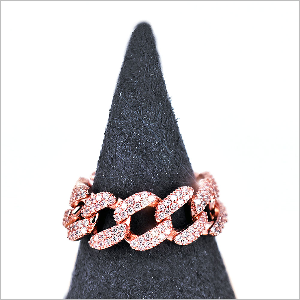Anello groumette in argento rosato e zirconi.