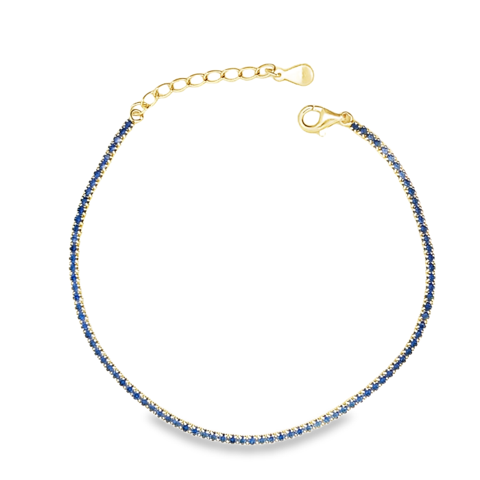 Bracciale in oro con zaffiri blu, catena regolabile e chiusura a moschettone.