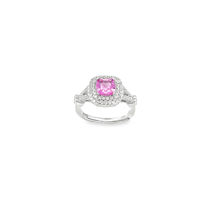 Anello in oro bianco con grande zaffiro rosa e diamanti.