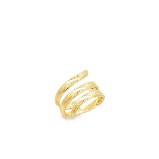 Anello a spirale in oro giallo con finitura irregolare, che avvolge il dito.