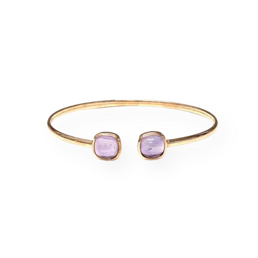 Bracciale a fascia in oro con due pietre di ametista taglio cuscino.