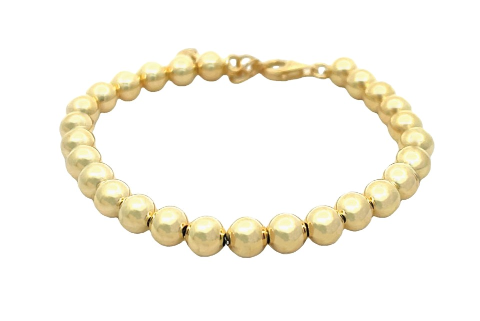 Braccialetto a catena d'oro con perline.