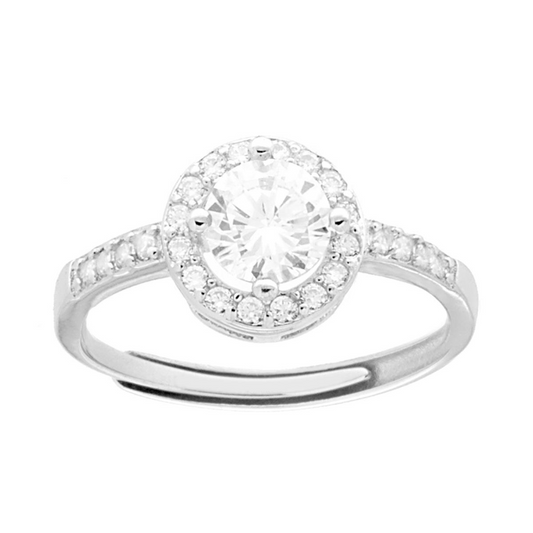 Anello in oro bianco con grande diamante rotondo circondato da pavé e brillanti sulla fascia.