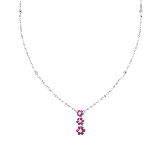 Collana in argento con ciondolo a forma di tre fiori rossi e punti luce.