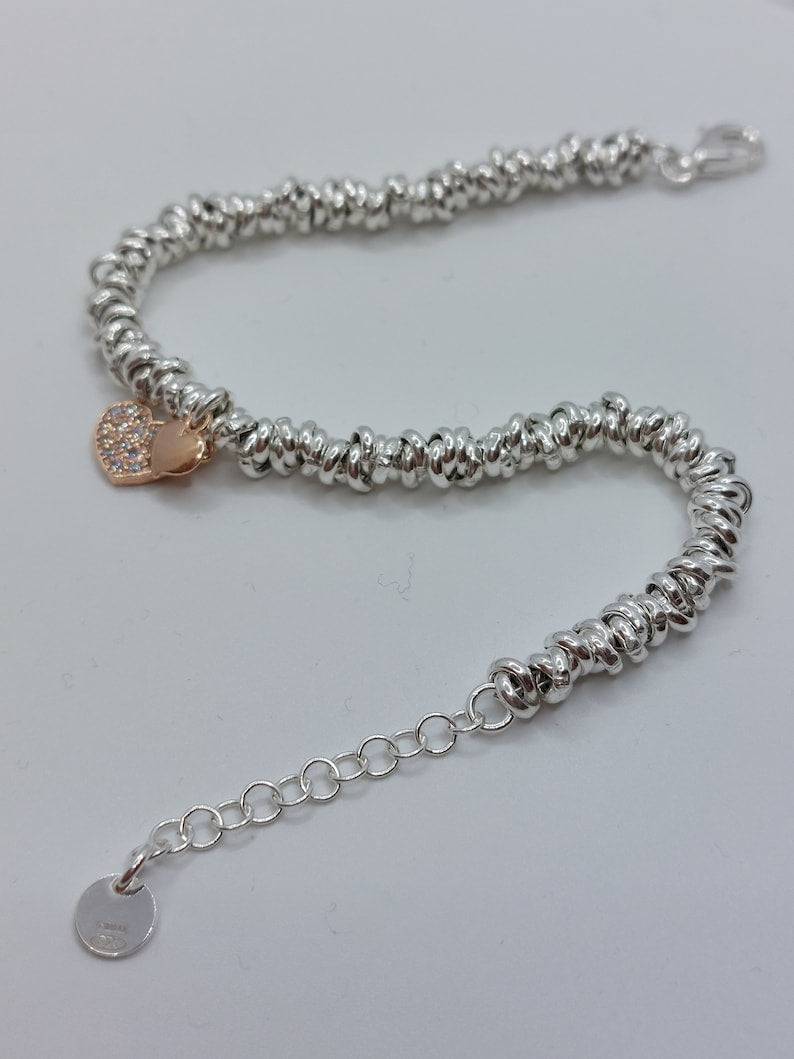 Bracciale Nodo a Cuore in Argento 925 - Eleganza e Simbolismo