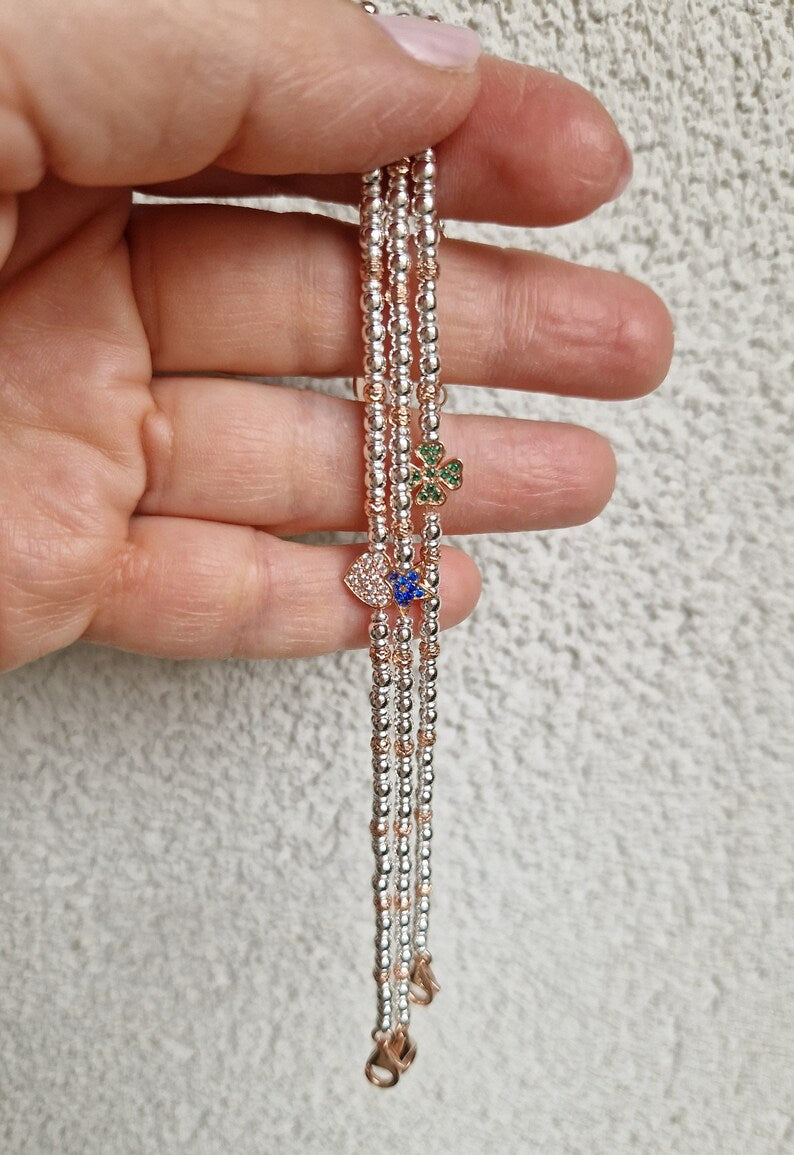 Braccialetti in Argento con Simbolo - Eleganza e Significato nei Gioielli